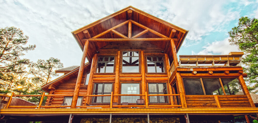 Ground up view shot of a wood cabin